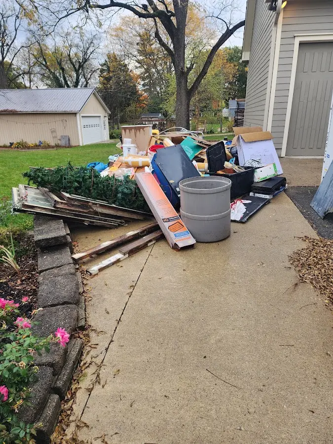 Dumpster being loaded with debris for Demolition Dumpster Rental in Mount Orab